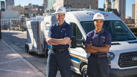 DUCTZ technicians in front of vans